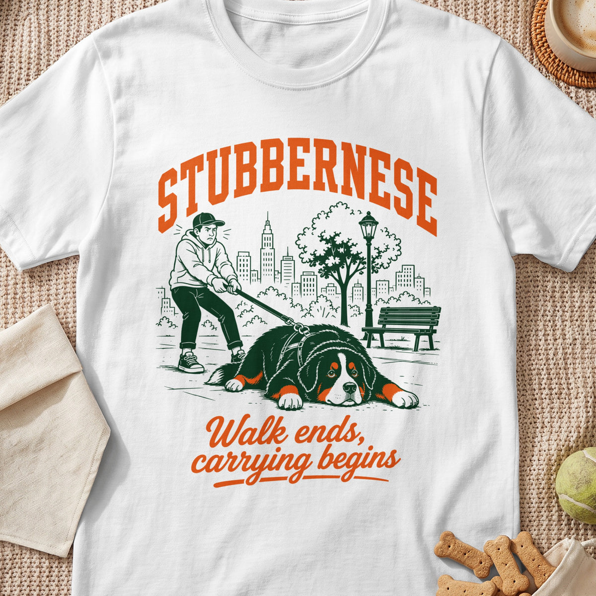 White t-shirt with "Stubbernese" and "Walk ends, carrying begins" text and graphic.