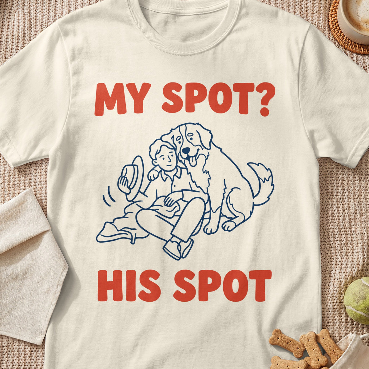Cream t-shirt with red text "MY SPOT? HIS SPOT" and blue line drawing of person and dog.
