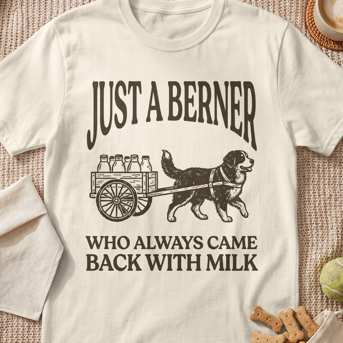 Bernese Mountain Dog pulling a cart with milk bottles, text "JUST A BERNER WHO ALWAYS CAME BACK WITH MILK".
