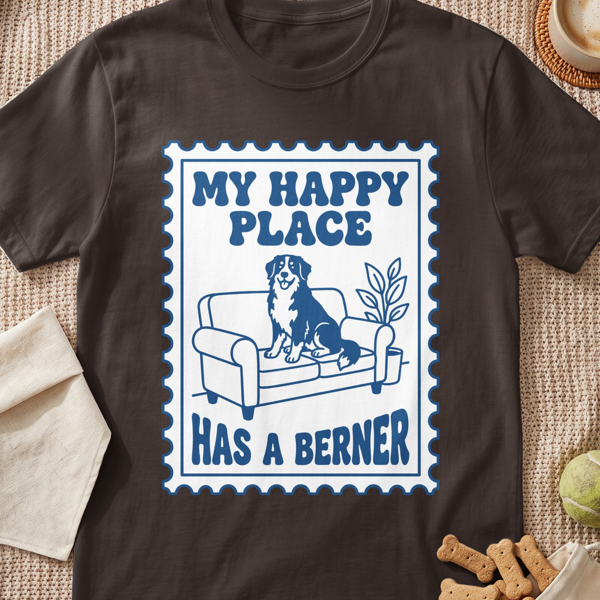 Berner dog on couch with text "MY HAPPY PLACE HAS A BERNER" in stamp design.