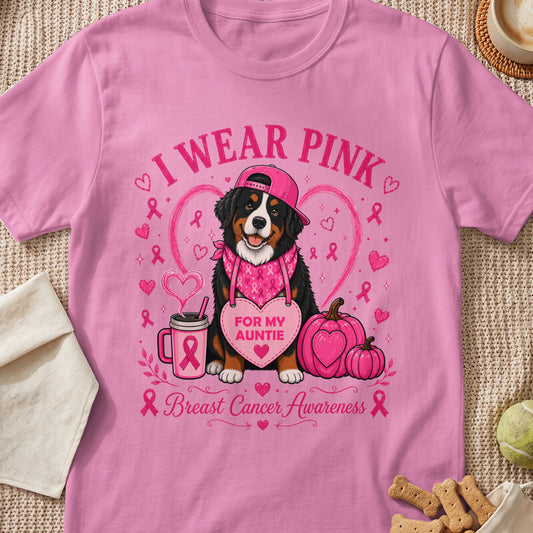 Bernese Mountain Dog wearing pink cap and bandana, saying "I wear pink for my auntie" and "Breast Cancer Awareness."