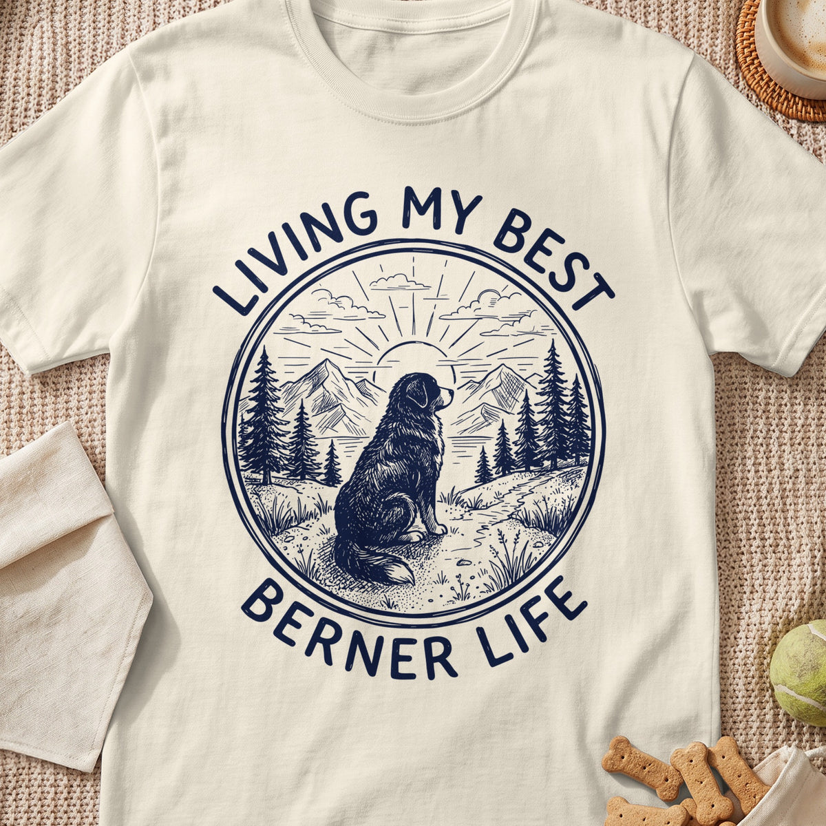 Berner dog sitting in landscape with text "LIVING MY BEST BERNER LIFE".