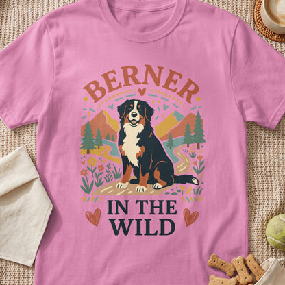 Bernese Mountain Dog graphic with "BERNER IN THE WILD" text on a pink shirt.